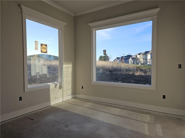 unfurnished room featuring ornamental molding