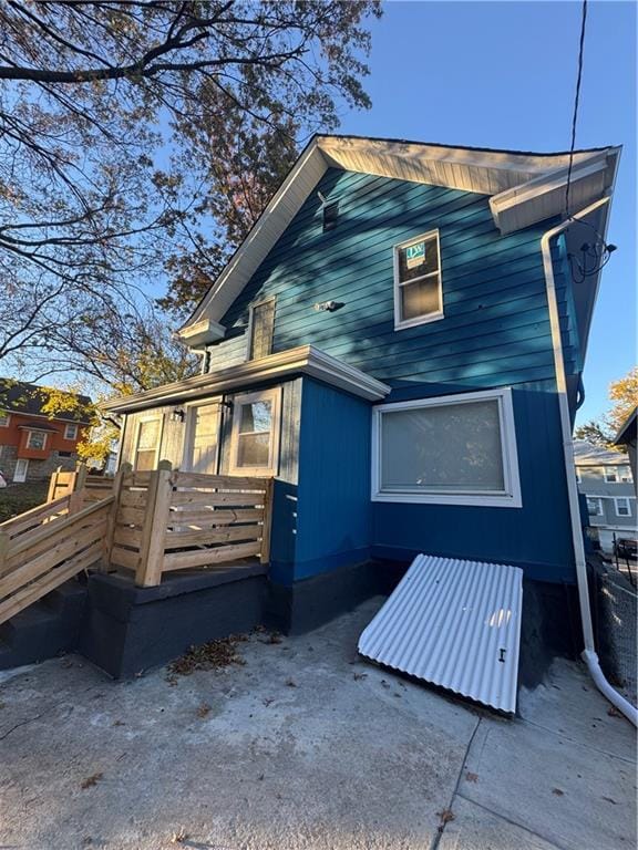 rear view of house with a deck