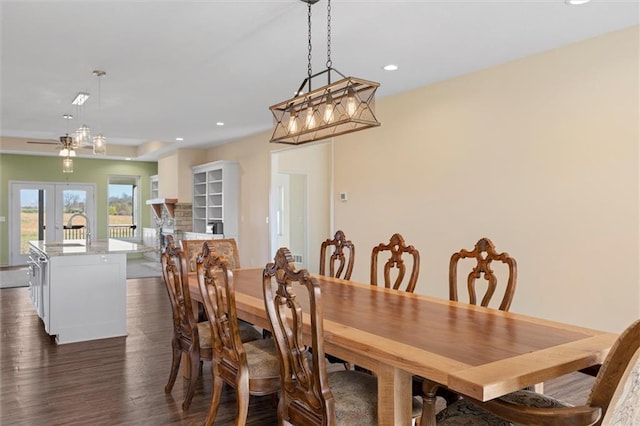 dining area featuring dark hardwood / wood-style floors and french doors