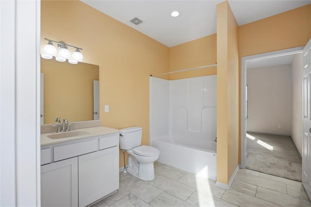 full bathroom with vanity, toilet, and washtub / shower combination