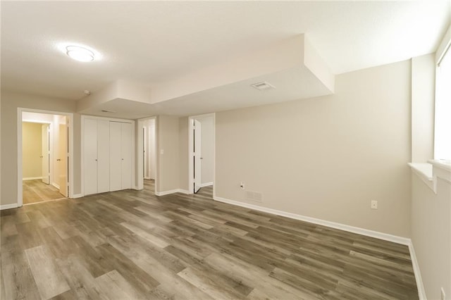 unfurnished room featuring hardwood / wood-style floors