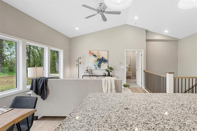dining area featuring a ceiling fan, a wealth of natural light, light wood finished floors, and recessed lighting