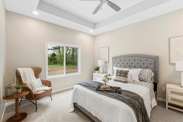 bedroom featuring light carpet, baseboards, and recessed lighting
