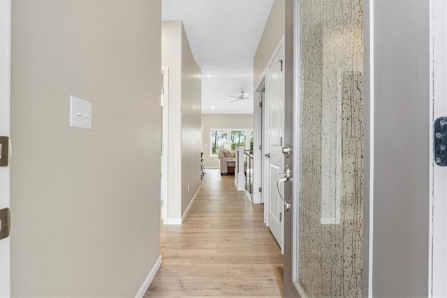 800 Highland Dr, Edwardsville, KS 66111 - hall featuring light wood-style flooring and baseboards