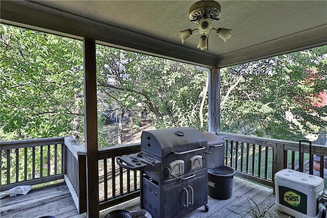 wooden deck featuring grilling area