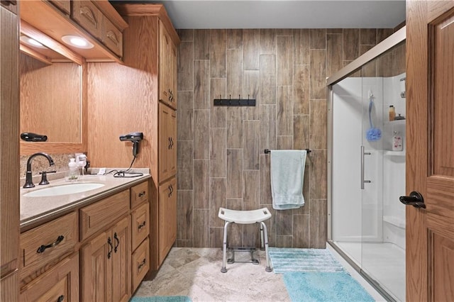 bathroom with vanity, tile patterned flooring, and a shower with shower door