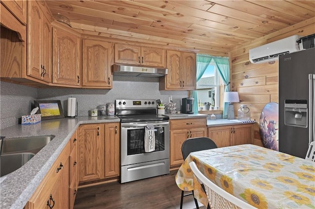 kitchen featuring fridge with ice dispenser, wood walls, stainless steel electric range oven, a wall mounted air conditioner, and dark wood-type flooring