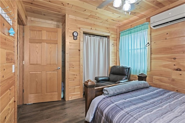 bedroom with wooden walls, wooden ceiling, dark hardwood / wood-style floors, ceiling fan, and a wall mounted air conditioner