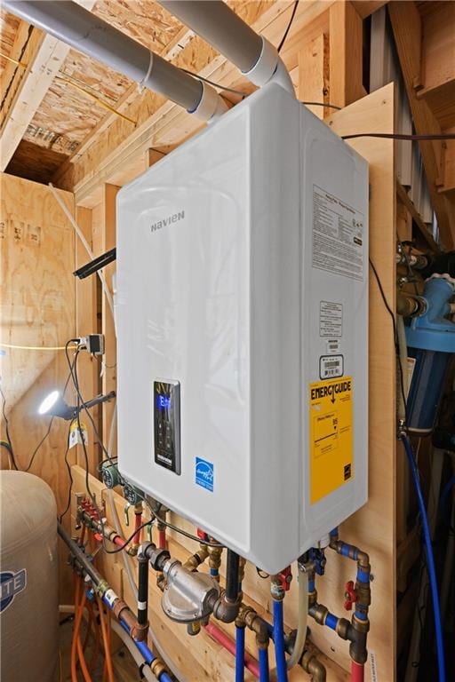 utility room with water heater