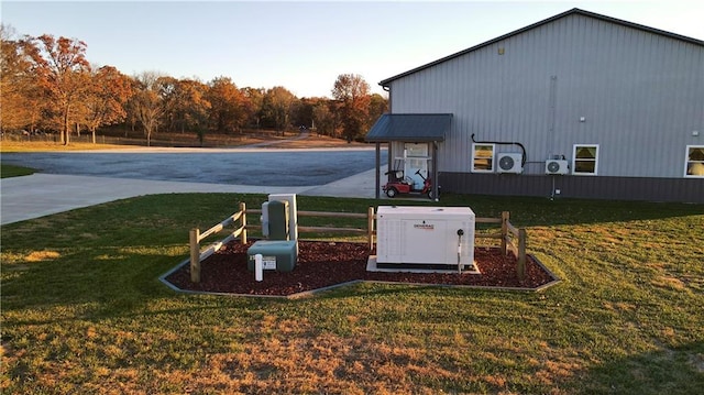 entry to storm shelter featuring a yard