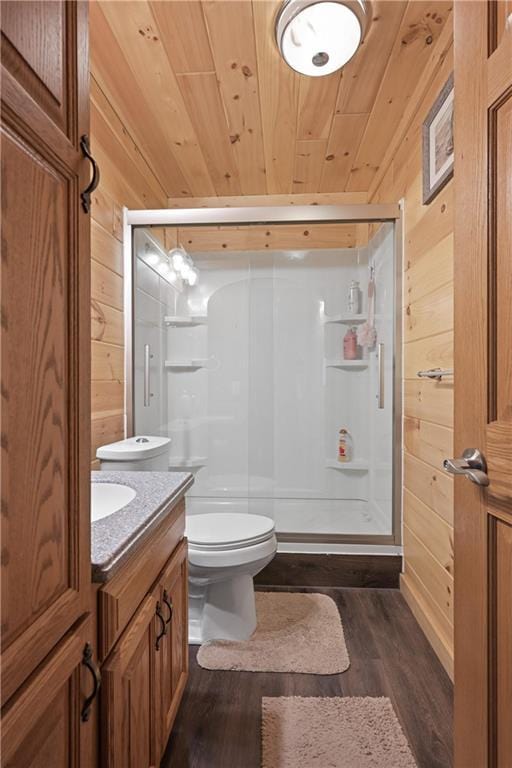 1185 Route E, Lockwood, MO 65682 - bathroom featuring wood ceiling, a stall shower, wood walls, wood finished floors, and toilet