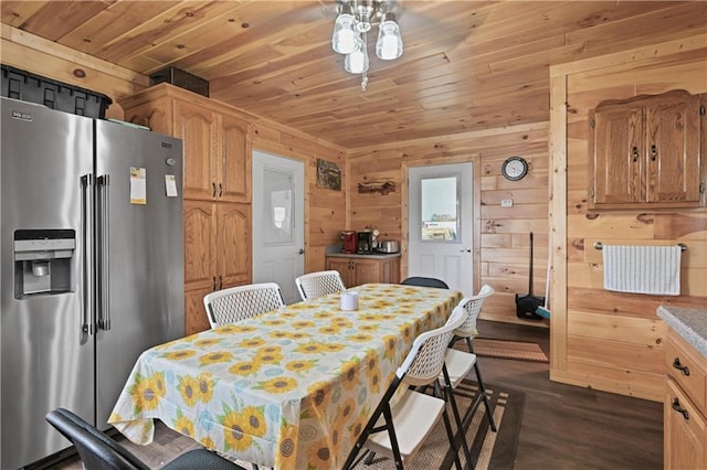 1185 Route E, Lockwood, MO 65682 - dining area featuring dark wood finished floors, wooden walls, and wooden ceiling