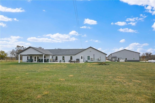 1185 Route E, Lockwood, MO 65682 - back of house with a lawn and a patio