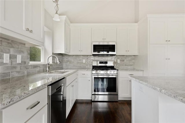 kitchen featuring white cabinets, dark hardwood / wood-style floors, sink, and appliances with stainless steel finishes