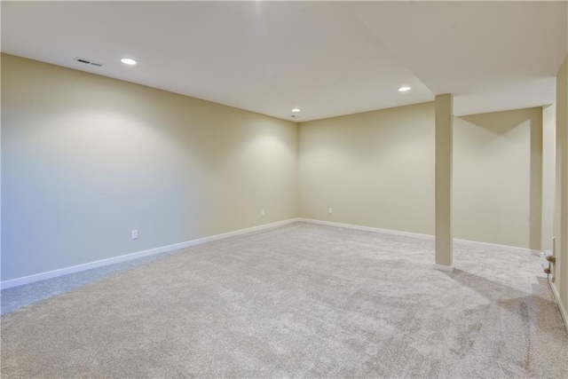 basement with light colored carpet