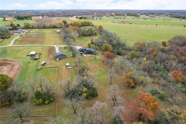 birds eye view of property featuring a rural view