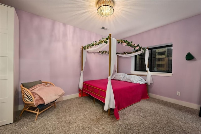 bedroom featuring carpet