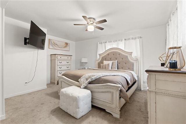 bedroom featuring ceiling fan and light colored carpet