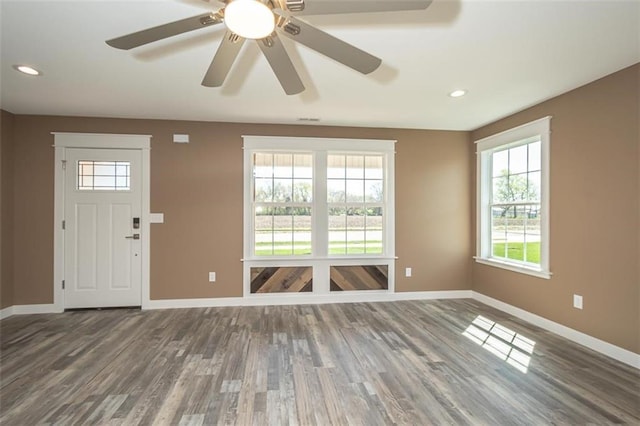 entryway featuring wood finished floors, baseboards, a ceiling fan, and recessed lighting