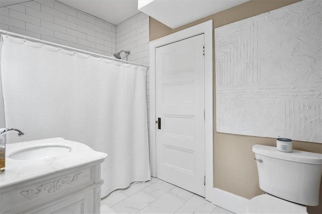 bathroom featuring toilet, a shower with shower curtain, vanity, baseboards, and marble finish floor