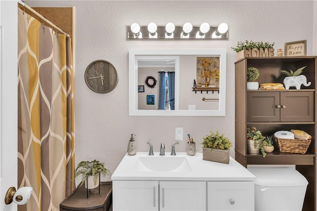 bathroom with vanity and a shower with shower curtain