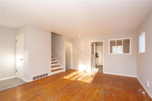 empty room featuring hardwood / wood-style floors