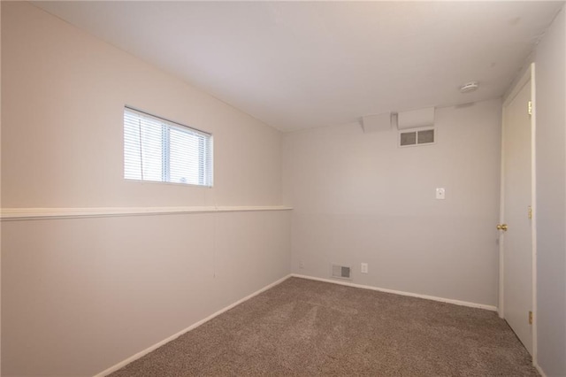 view of carpeted spare room