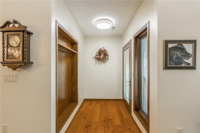 hall featuring hardwood / wood-style floors