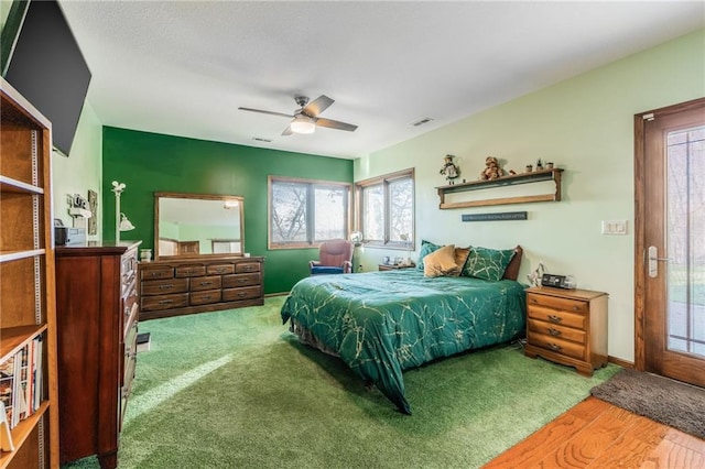 bedroom featuring ceiling fan and hardwood / wood-style floors