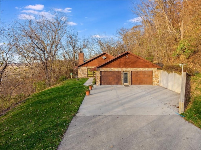 view of home's exterior featuring a garage and a yard