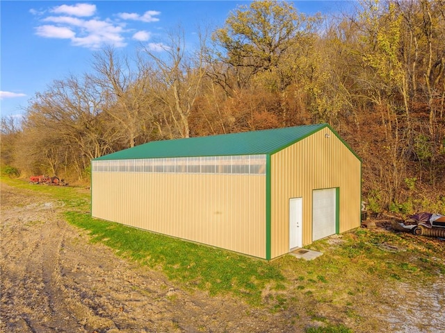 view of outdoor structure featuring a garage