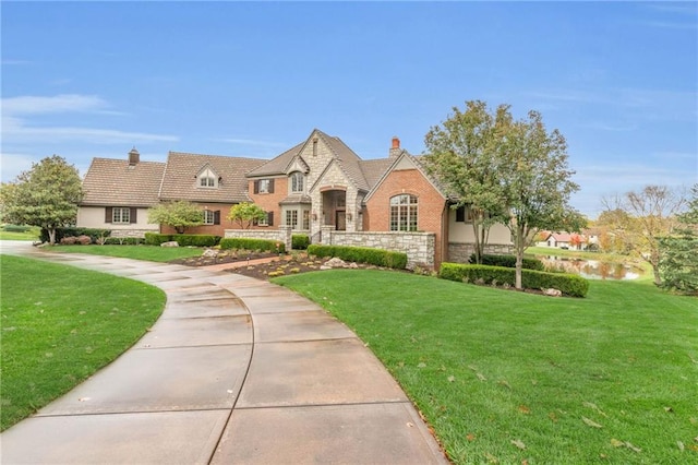 view of front of home with a front lawn