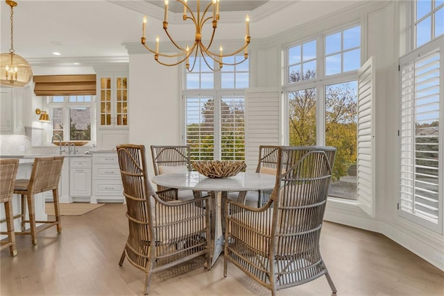 dining room featuring light hardwood / wood-style floors and plenty of natural light