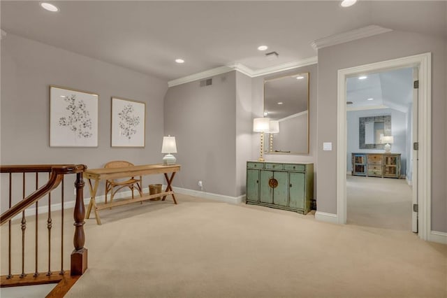 sitting room featuring carpet flooring, crown molding, and vaulted ceiling