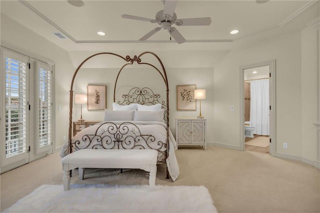 bedroom featuring ensuite bathroom, ceiling fan, light carpet, and access to exterior