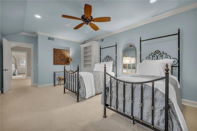 carpeted bedroom with vaulted ceiling, ceiling fan, and crown molding