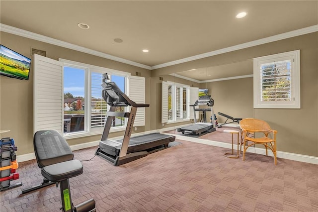 exercise area featuring light carpet and ornamental molding