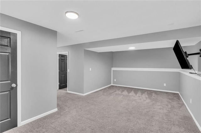 basement with light colored carpet