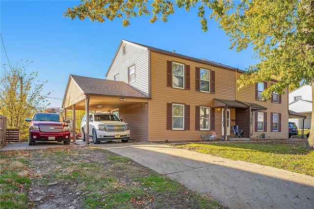 view of front of property with a carport