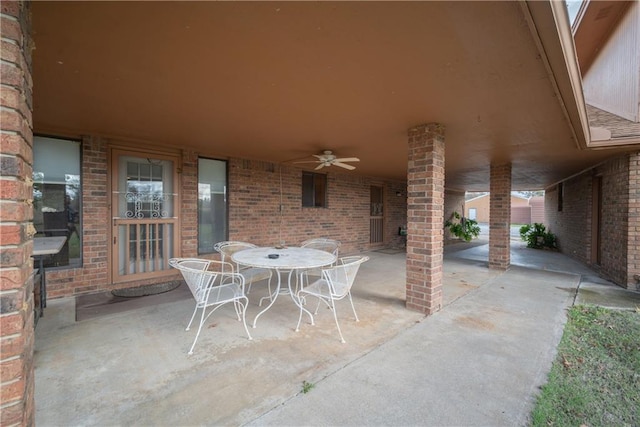 view of patio featuring ceiling fan