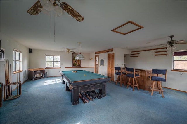 recreation room with bar, carpet flooring, a wealth of natural light, and billiards