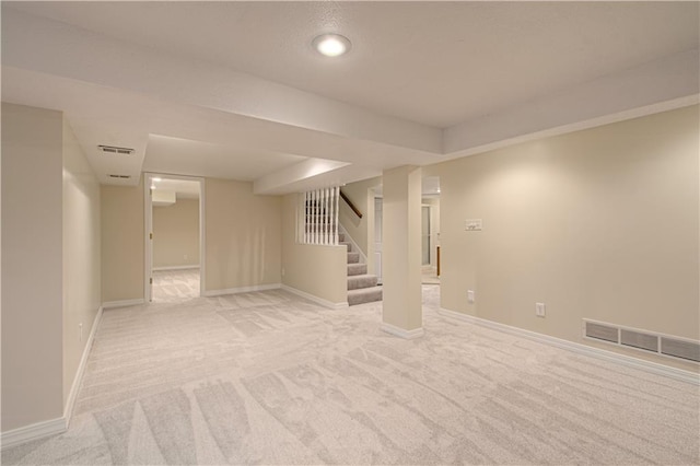 basement with light carpet