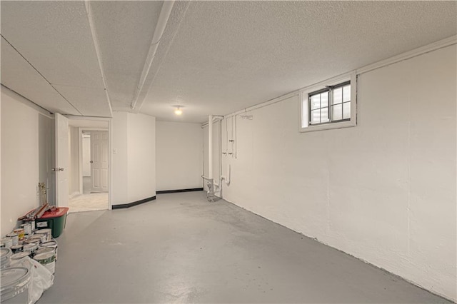 basement with a textured ceiling