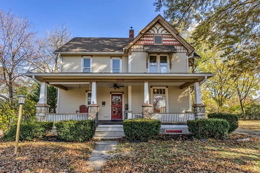 victorian-style house with a porch