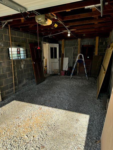 garage featuring a garage door opener