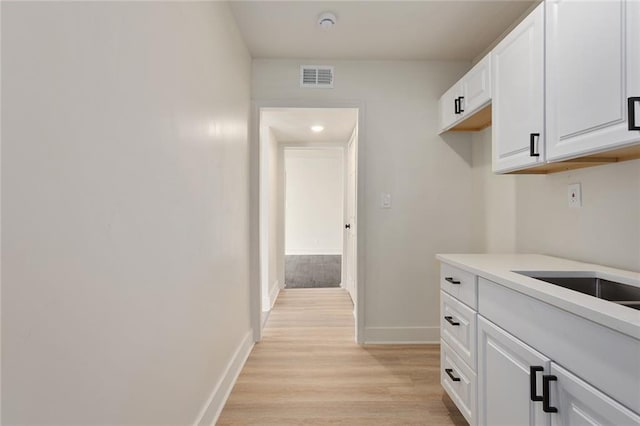 interior space with light hardwood / wood-style floors