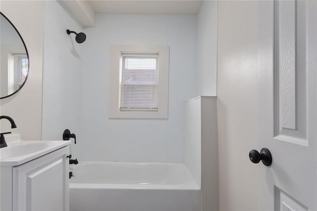 bathroom with shower / tub combination and vanity