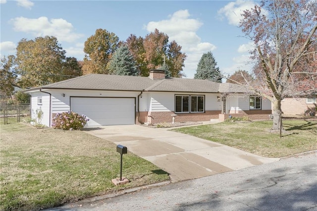 ranch-style house featuring a garage and a front yard