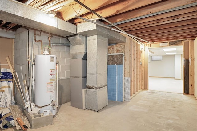 basement with water heater and heating unit