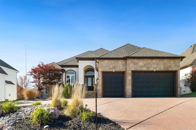 view of front of home with a garage